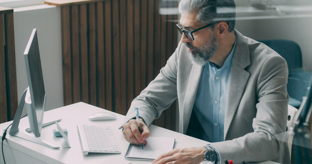 data analyst reviewing insurance reports
