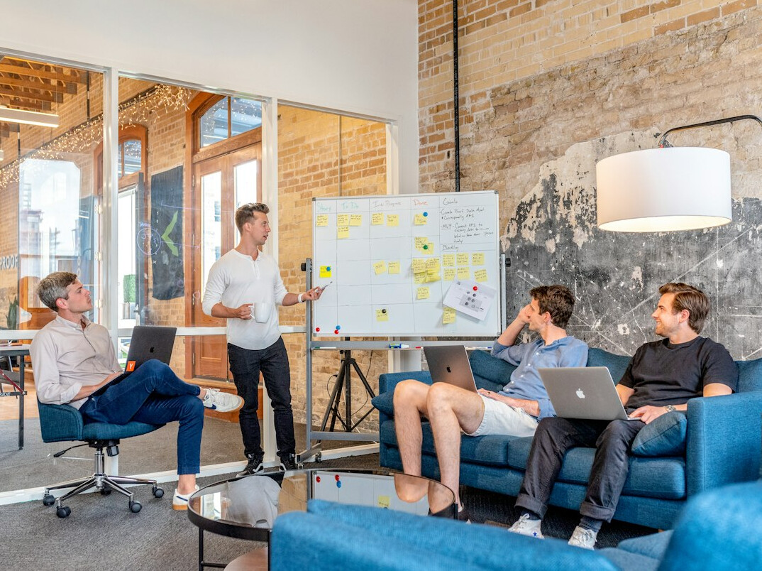 team meeting on insurance tech